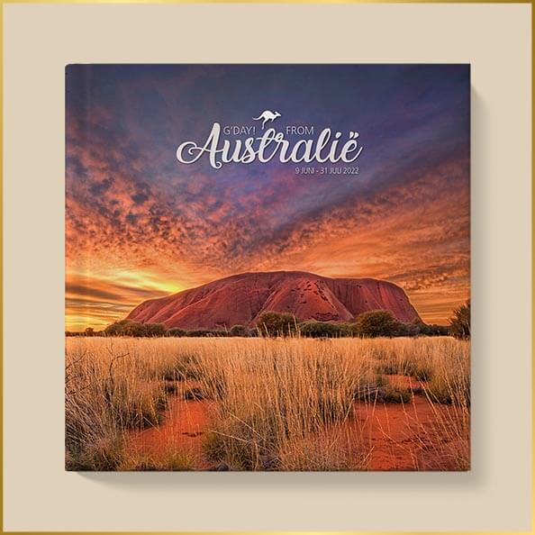 Omslag fotoboek Uluru in Australië met zonsopkomst