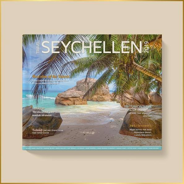 Omslag van fotoboek met tropisch strand en palmbomen op de Seychellen